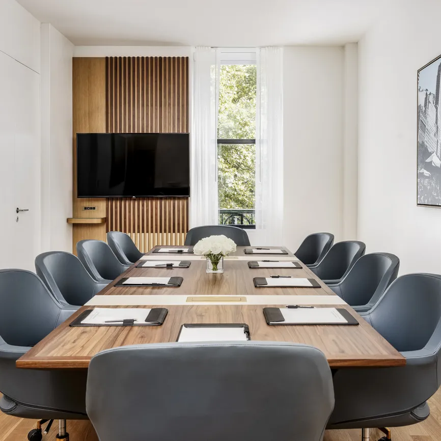 Boardroom Suite meeting table with skyline view