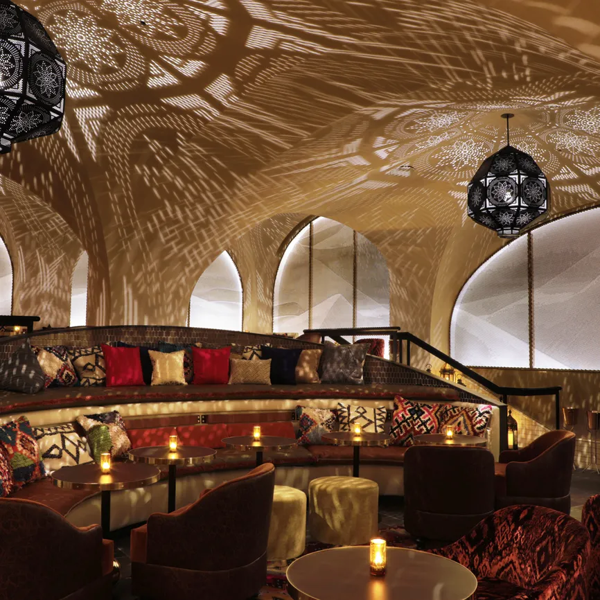 Célon Bar & Lounge dining room with domed ceiling and lantern lighting