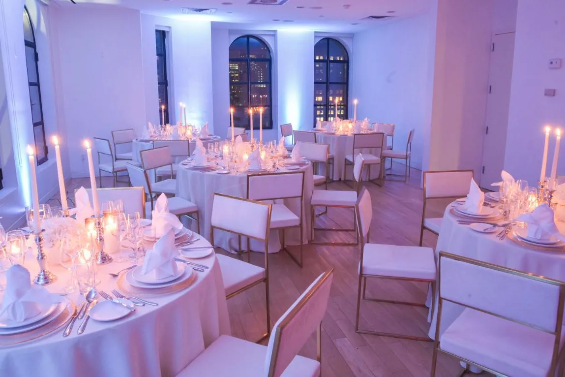 Conference Room set for a formal dinner with blue mood lighting