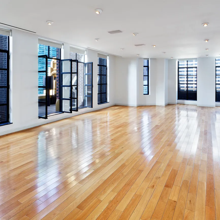 Terrace Loft event space with tall windows and hardwood floors