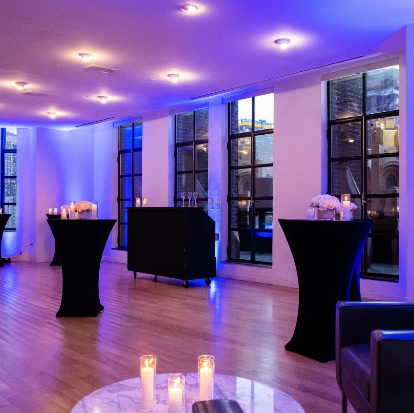 Conference Room set for a reception with purple lounge seating