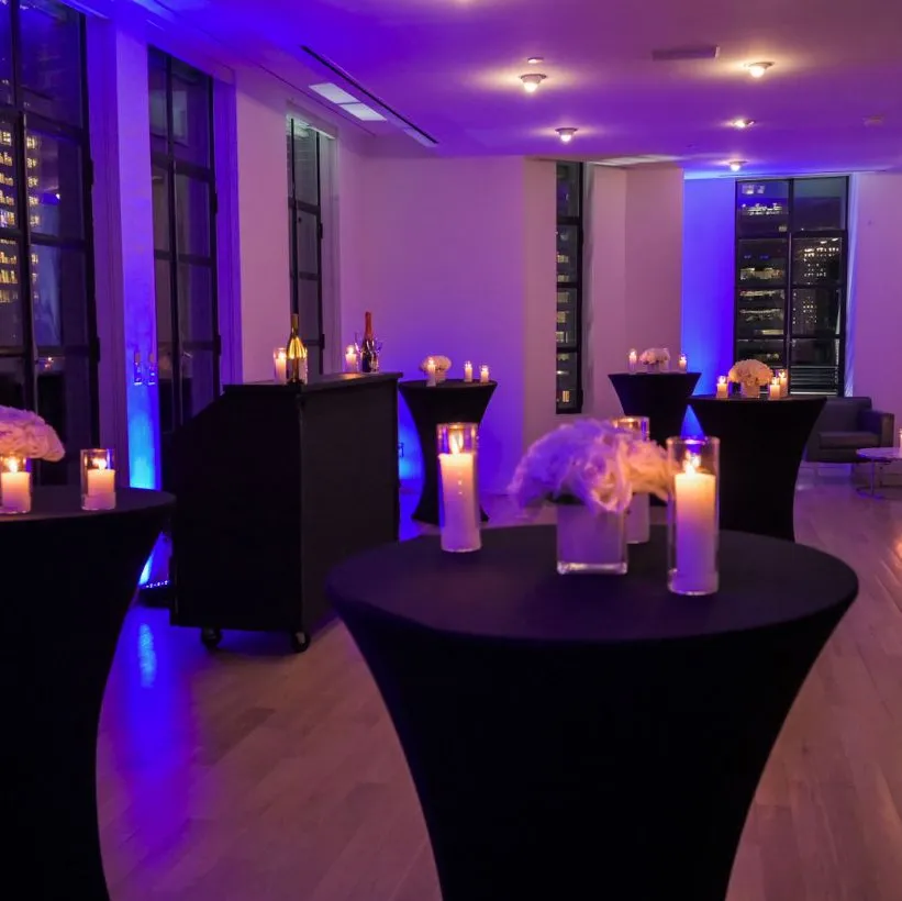Conference Room set for a cocktail reception with purple lighting