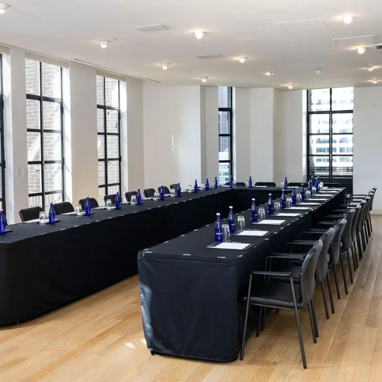 Conference Room set up boardroom-style with rectangular table